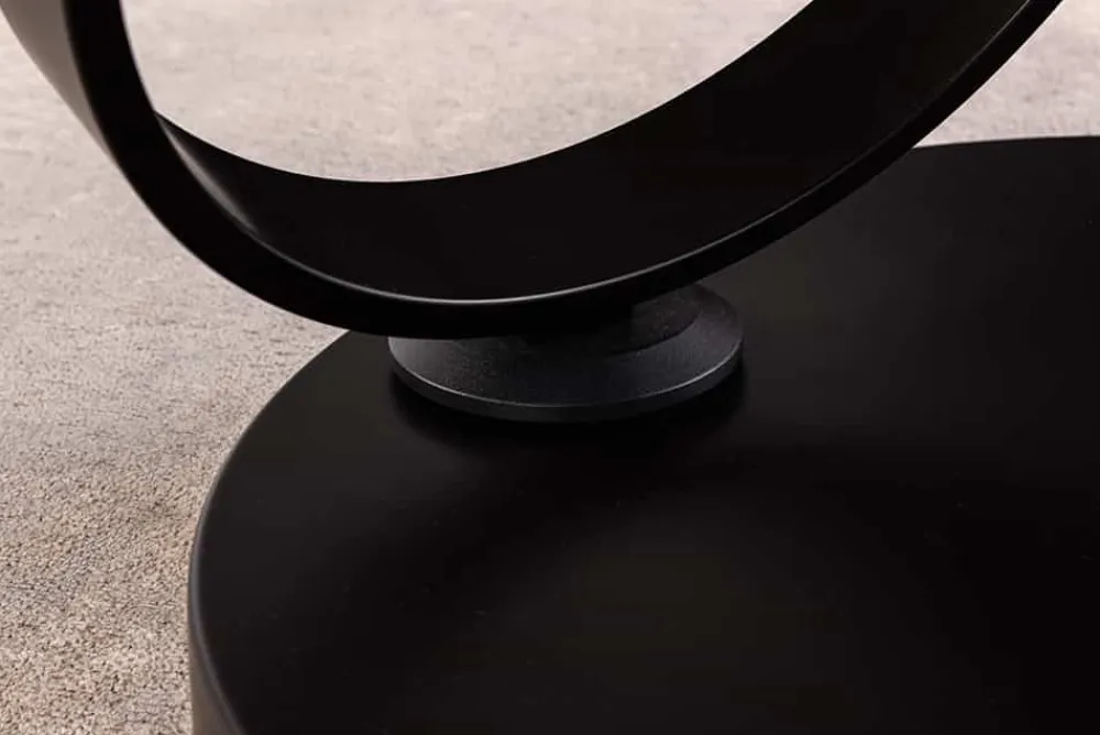 Riess-Ambiente Couchtische & Truhen > Design Couchtisch DANCING RINGS rost rund drehbar Travertin Keramik schwarz Gestell