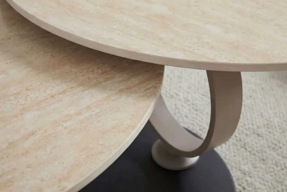 Riess-Ambiente Couchtische & Truhen > Design Couchtisch DANCING RINGS natur rund drehbar Travertin Keramik champagner greige