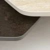 Riess-Ambiente Couchtische & Truhen > Design Couchtisch MOVEMENT rost Pentagon drehbar Travertin Keramik schwarz Metall