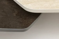 Riess-Ambiente Couchtische & Truhen > Design Couchtisch MOVEMENT rost Pentagon drehbar Travertin Keramik schwarz Metall