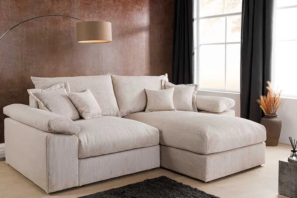 Riess-Ambiente Skandinavisch|Ecksofa > Design Ecksofa ATMOSPHERE XL 245cm champagner beige Cord Federkern inkl. Kissen