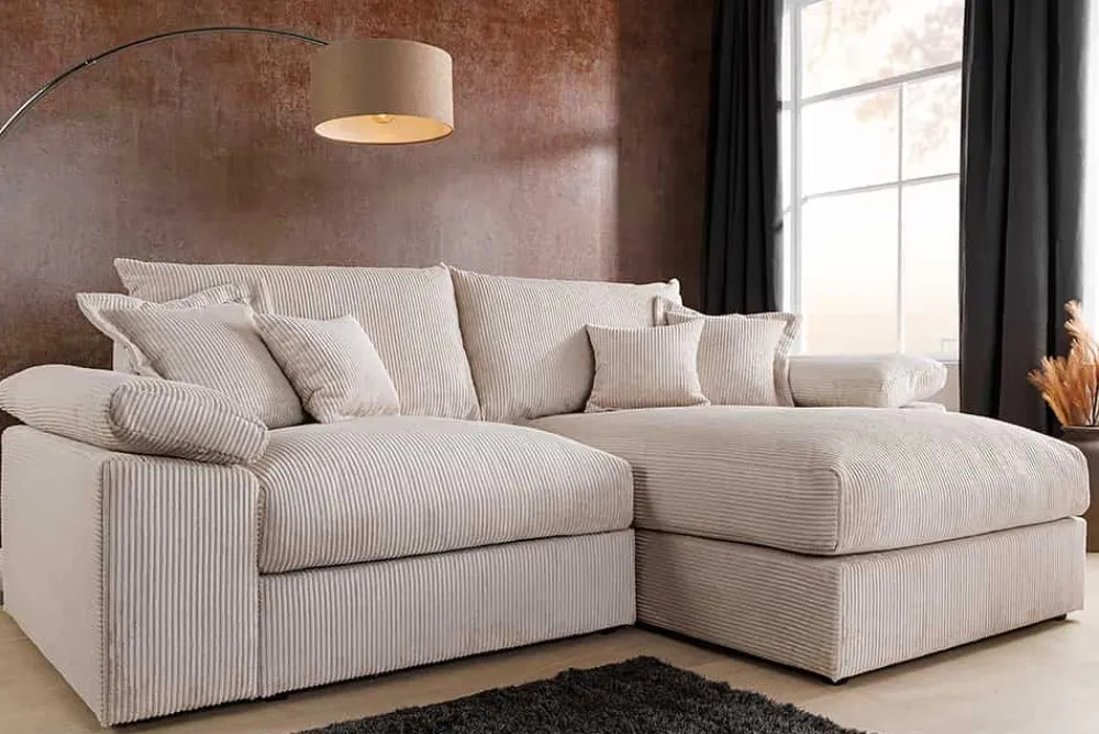 Riess-Ambiente Skandinavisch|Ecksofa > Design Ecksofa ATMOSPHERE XL 245cm champagner beige Cord Federkern inkl. Kissen