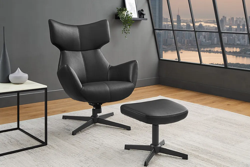 Riess-Ambiente Sitzhocker|Industrial Loft > Design Hocker VOGUE 45cm schwarz Kunstleder drehbar Metallbeine Fußhocker
