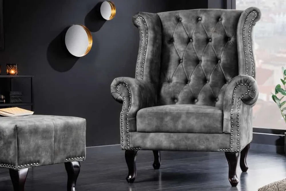 Riess-Ambiente Sessel|Samt Möbel > Design Ohrensessel CHESTERFIELD 105cm grau Samt silber Nieten