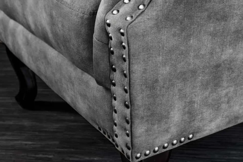 Riess-Ambiente Sessel|Samt Möbel > Design Ohrensessel CHESTERFIELD 105cm grau Samt silber Nieten