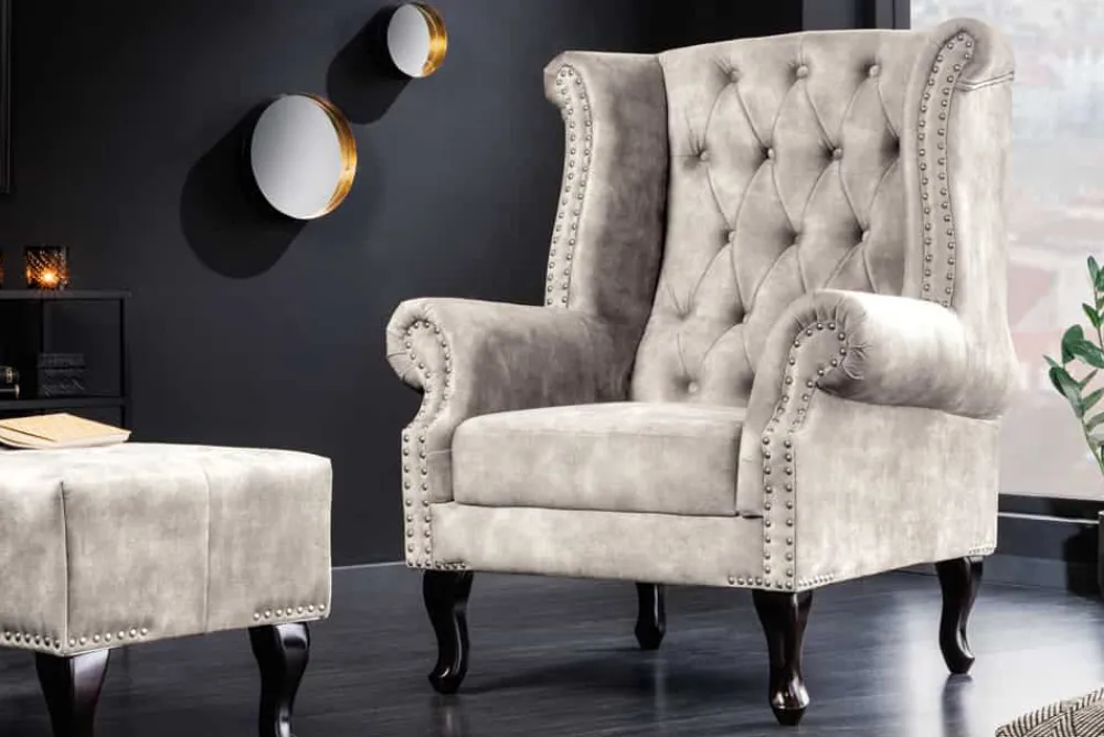 Riess-Ambiente Sessel|Samt Möbel > Design Ohrensessel CHESTERFIELD 105cm champagner beige Samt silber Ziernieten