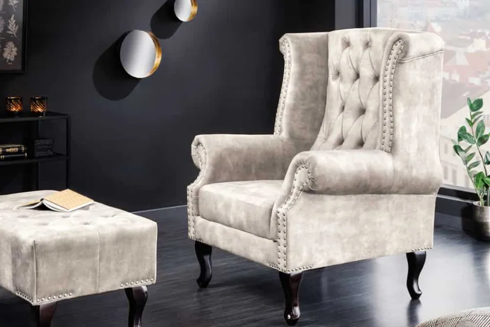 Riess-Ambiente Sessel|Samt Möbel > Design Ohrensessel CHESTERFIELD 105cm champagner beige Samt silber Ziernieten