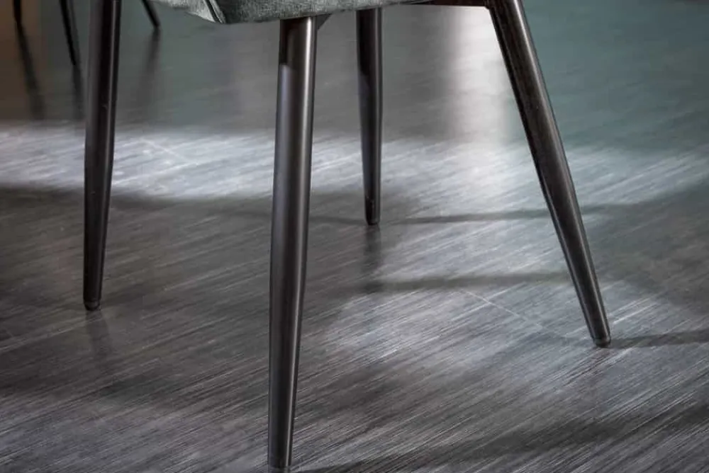 Riess-Ambiente Stühle|Samt Möbel > Design Stuhl MILANO grün Samt mit Armlehne Ziersteppung gepolstert schwarze Metallbeine