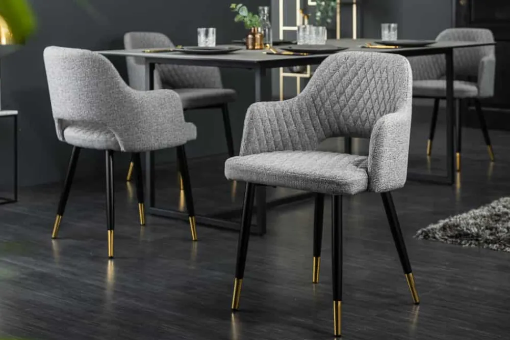 Riess-Ambiente Retro Möbel|Stühle > Design Stuhl PARIS hellgrau Strukturstoff mit Armlehnen Ziersteppung goldene Fußkappen