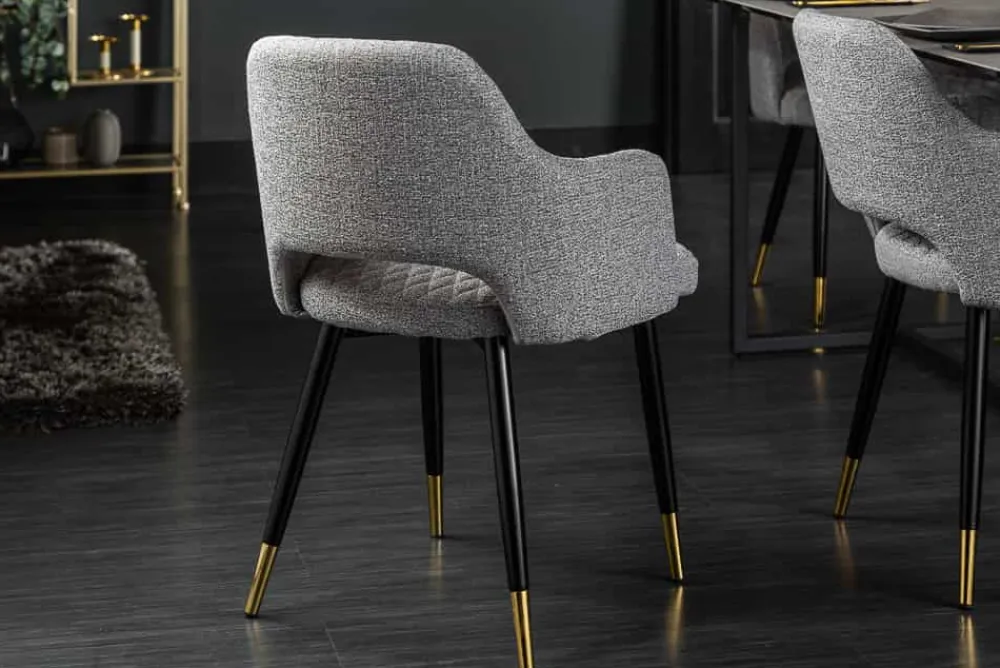 Riess-Ambiente Retro Möbel|Stühle > Design Stuhl PARIS hellgrau Strukturstoff mit Armlehnen Ziersteppung goldene Fußkappen