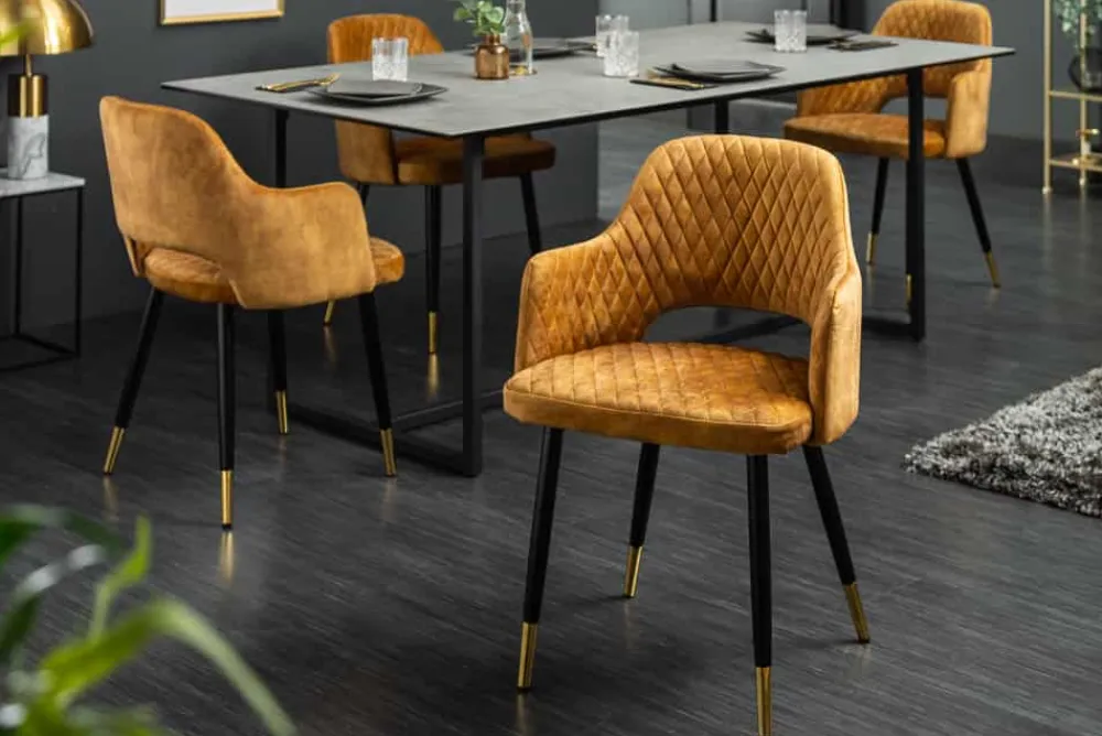 Riess-Ambiente Retro Möbel|Stühle > Design Stuhl PARIS senfgelb Samt mit Armlehnen Ziersteppung goldene Fußkappen