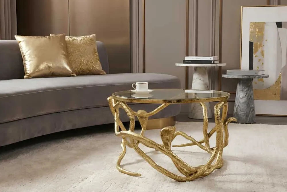 Riess-Ambiente Goldene Möbel|Couchtische & Truhen > Extravaganter Couchtisch SNAKE 70cm gold rund Metall Schlangen-Skulptur Glasplatte