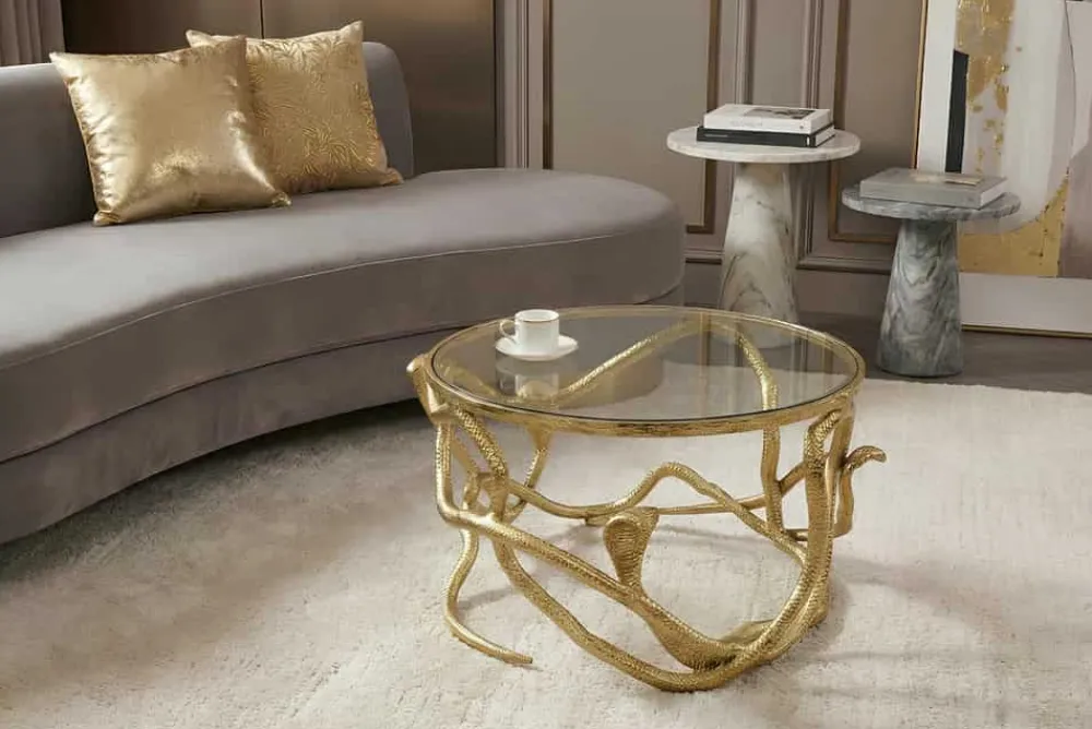 Riess-Ambiente Goldene Möbel|Couchtische & Truhen > Extravaganter Couchtisch SNAKE 70cm gold rund Metall Schlangen-Skulptur Glasplatte