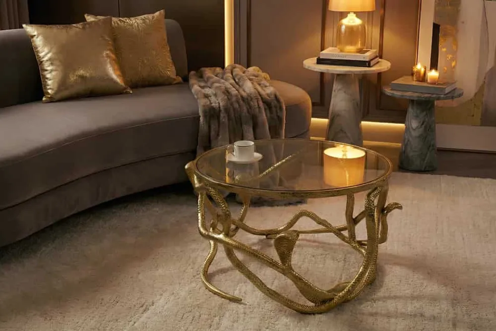 Riess-Ambiente Goldene Möbel|Couchtische & Truhen > Extravaganter Couchtisch SNAKE 70cm gold rund Metall Schlangen-Skulptur Glasplatte
