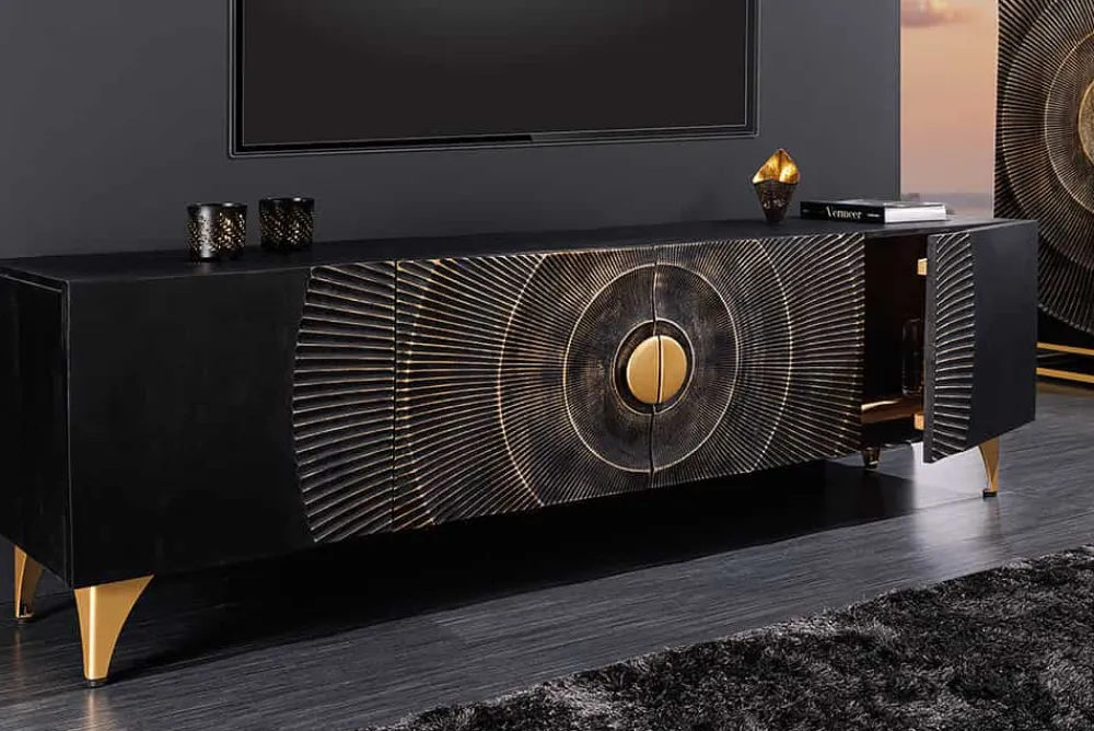 Riess-Ambiente Goldene Möbel|Tv- & Lowboards > Handgearbeitetes TV-Lowboard GOLDEN SUNSET 180cm schwarz mit 3D Schnitzereien gold Mangoholz massiv Metallfüße