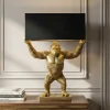 Riess-Ambiente Tischlampen > Handgefertigte Tischlampe KING APE 70cm schwarz gold Stoffschirm Affen-Skulptur
