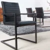 Riess-Ambiente Freischwinger|Industrial Loft > Industrial Freischwinger Stuhl LOFT antik schwarz Kunstleder mit Armlehne Eisengestell