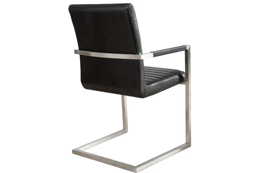 Riess-Ambiente Freischwinger|Industrial Loft > Industrial Freischwinger Stuhl LOFT antik schwarz Kunstleder mit Armlehne Edelstahl