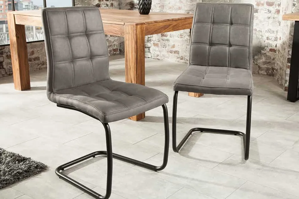Riess-Ambiente Freischwinger|Industrial Loft > Industrial Freischwinger Stuhl MODENA vintage grau mit Ziersteppung