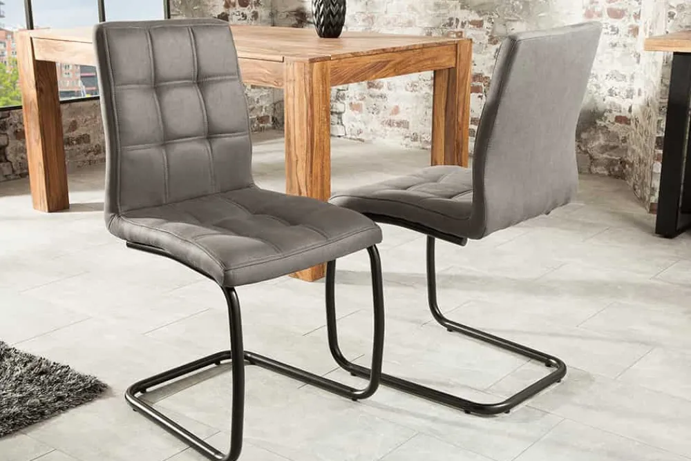 Riess-Ambiente Freischwinger|Industrial Loft > Industrial Freischwinger Stuhl MODENA vintage grau mit Ziersteppung