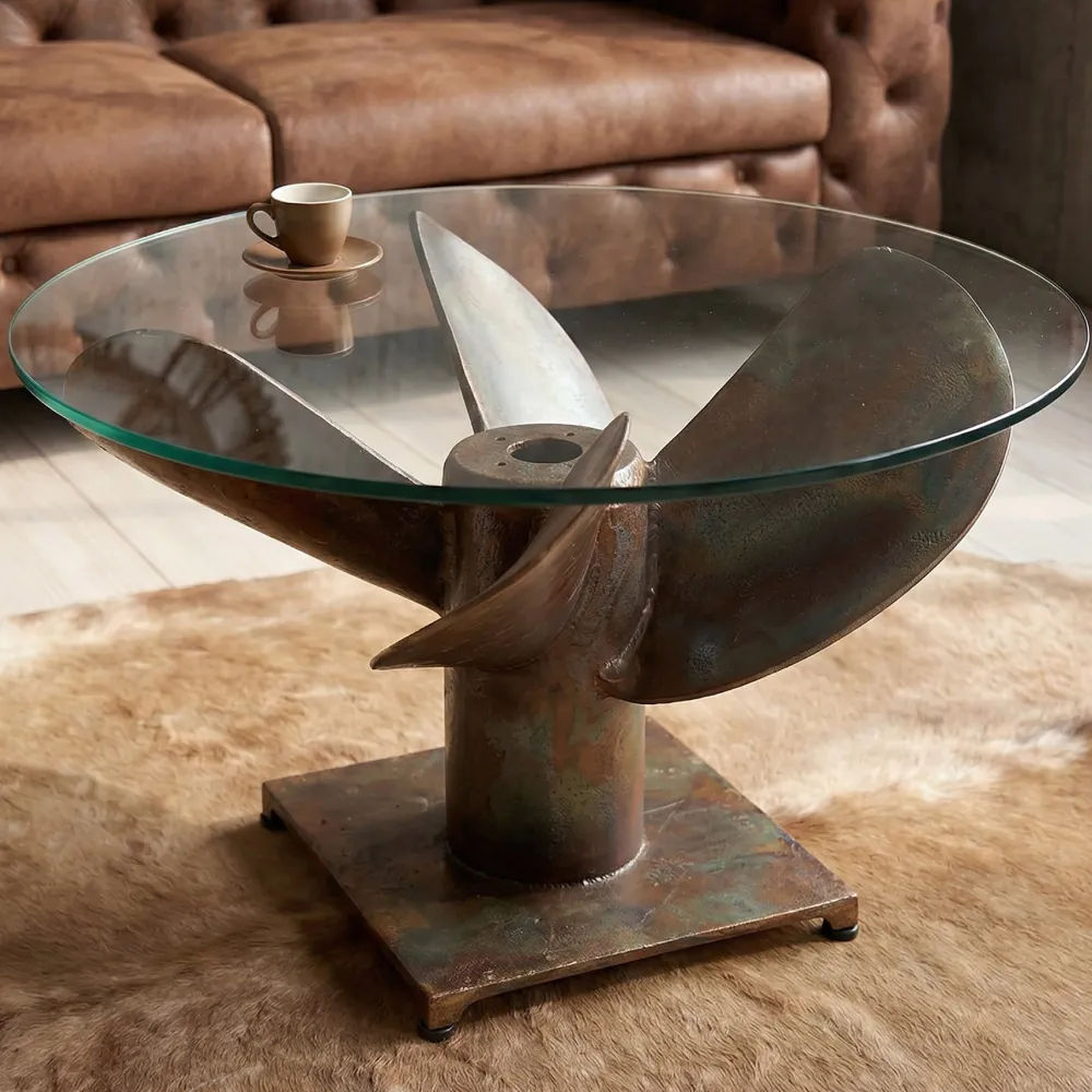 Riess-Ambiente Couchtische & Truhen > Maritimer Couchtisch OCEAN M 60cm kupfer geflammt rund Schiffsschraube Glasplatte