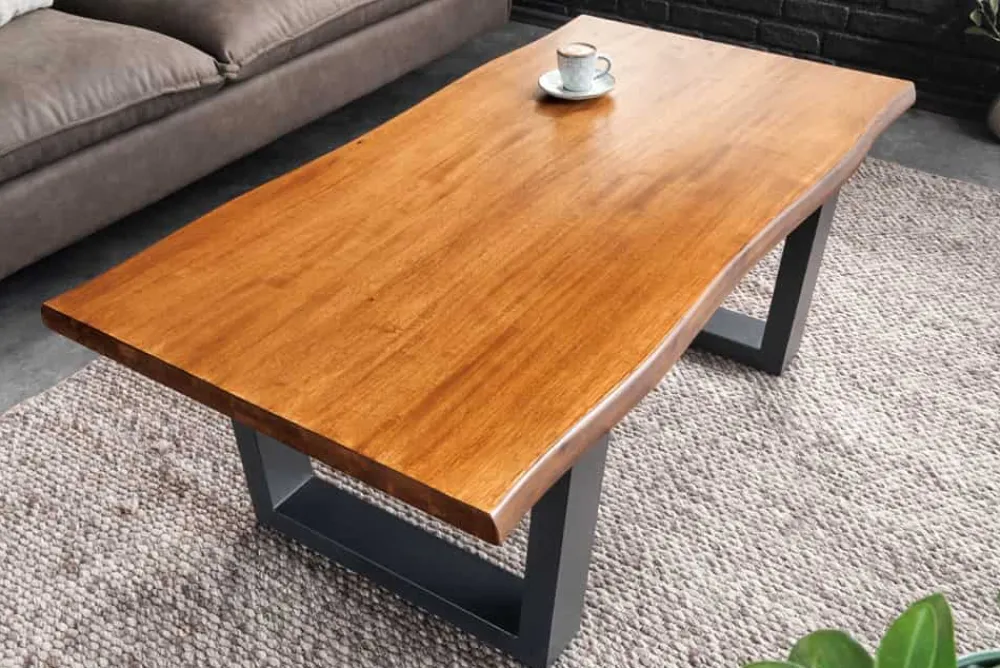 Riess-Ambiente Mehr...|Massivholztische > Massiver Couchtisch GENESIS 110cm braun Akazienholz Baumkante V-Gestell