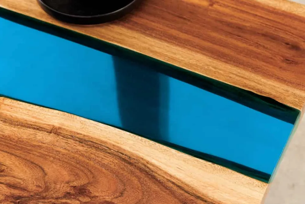 Riess-Ambiente Mehr...|Couchtische > Massiver Couchtisch LIQUID 110cm braun Akazienholz Baumkante schwarz Eisen blau