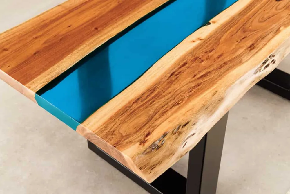 Riess-Ambiente Mehr...|Couchtische > Massiver Couchtisch LIQUID 110cm braun Akazienholz Baumkante schwarz Eisen blau