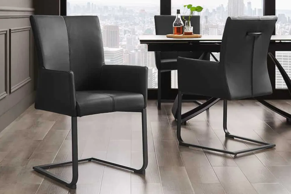 Riess-Ambiente Freischwinger|Industrial Loft > Moderner Freischwinger SAMSON schwarz Echtleder mit Armlehne und Metallrahmen