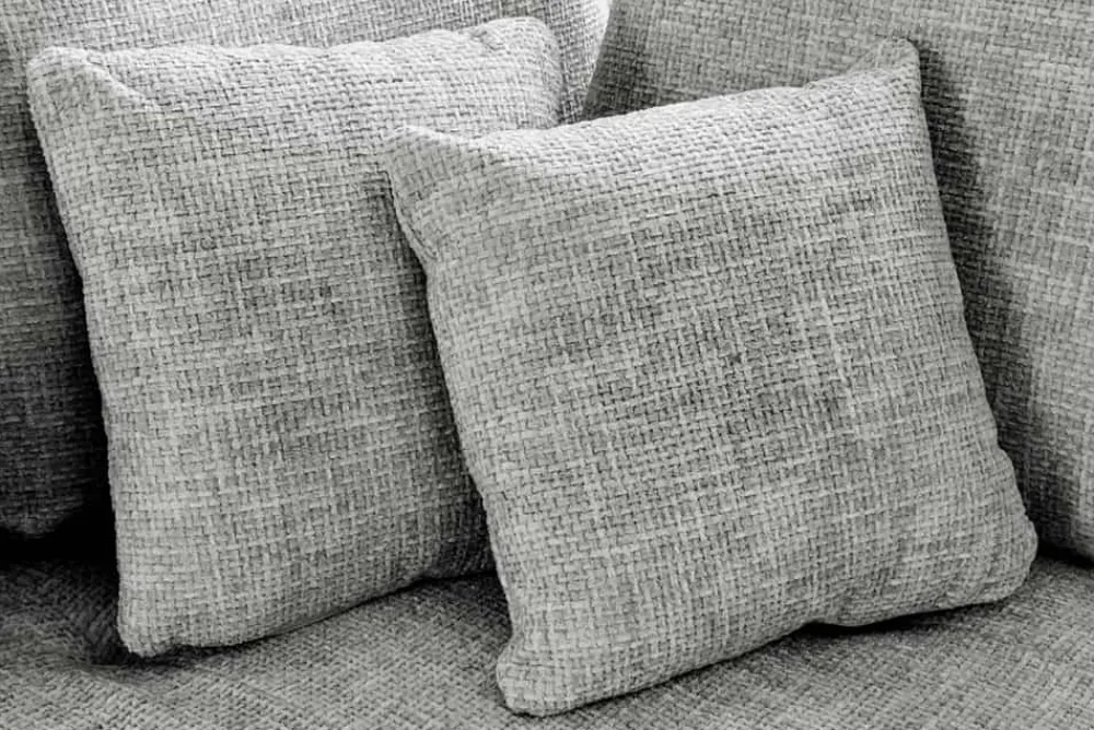 Riess-Ambiente Skandinavisch|Xxl Sofa > Moderne Wohnlandschaft KENT 220cm grau Strickstoff Ecksofa inkl. Hocker und Kissen