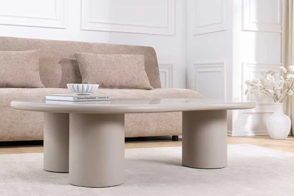 Riess-Ambiente Couchtische & Truhen > Stilvoller Couchtisch ORGANIKO 130cm cement greige organische Form