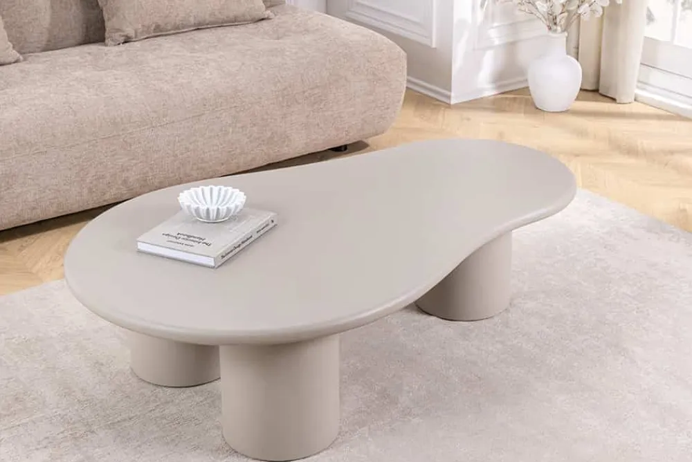 Riess-Ambiente Couchtische & Truhen > Stilvoller Couchtisch ORGANIKO 130cm cement greige organische Form
