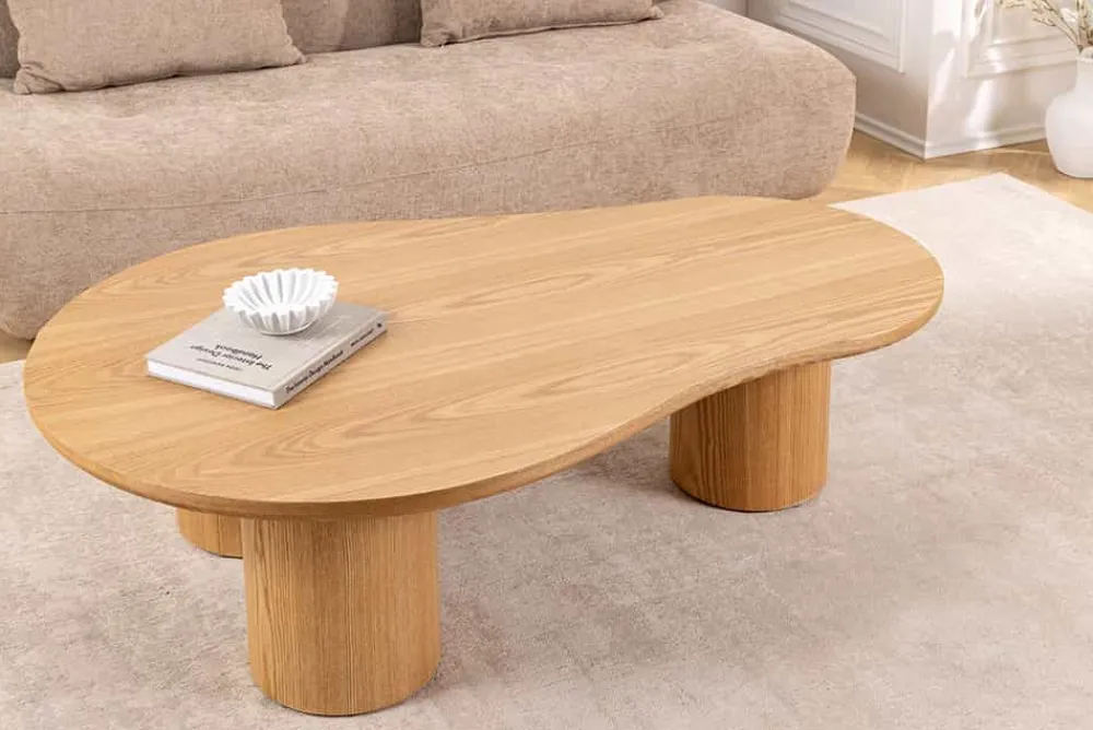 Riess-Ambiente Couchtische & Truhen > Stilvoller Couchtisch ORGANIKO 130cm natur Eiche organische Form
