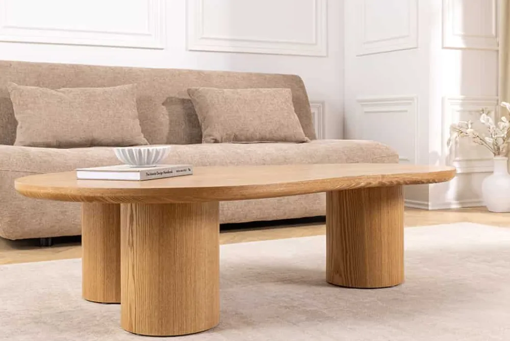 Riess-Ambiente Couchtische & Truhen > Stilvoller Couchtisch ORGANIKO 130cm natur Eiche organische Form